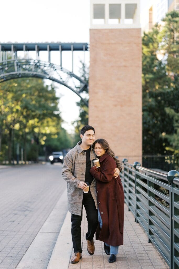 Couple hugging and walking along a bride at The Woodlands of Texas