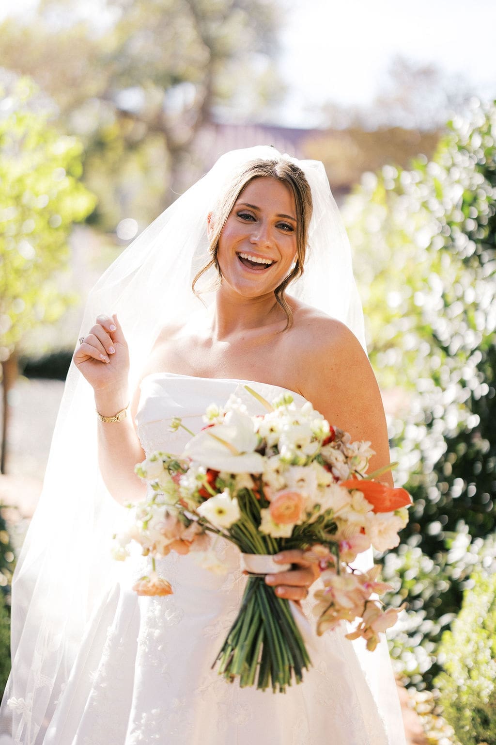 A gorgeous bridal portrait at Woodbine Mansion out in the garden
