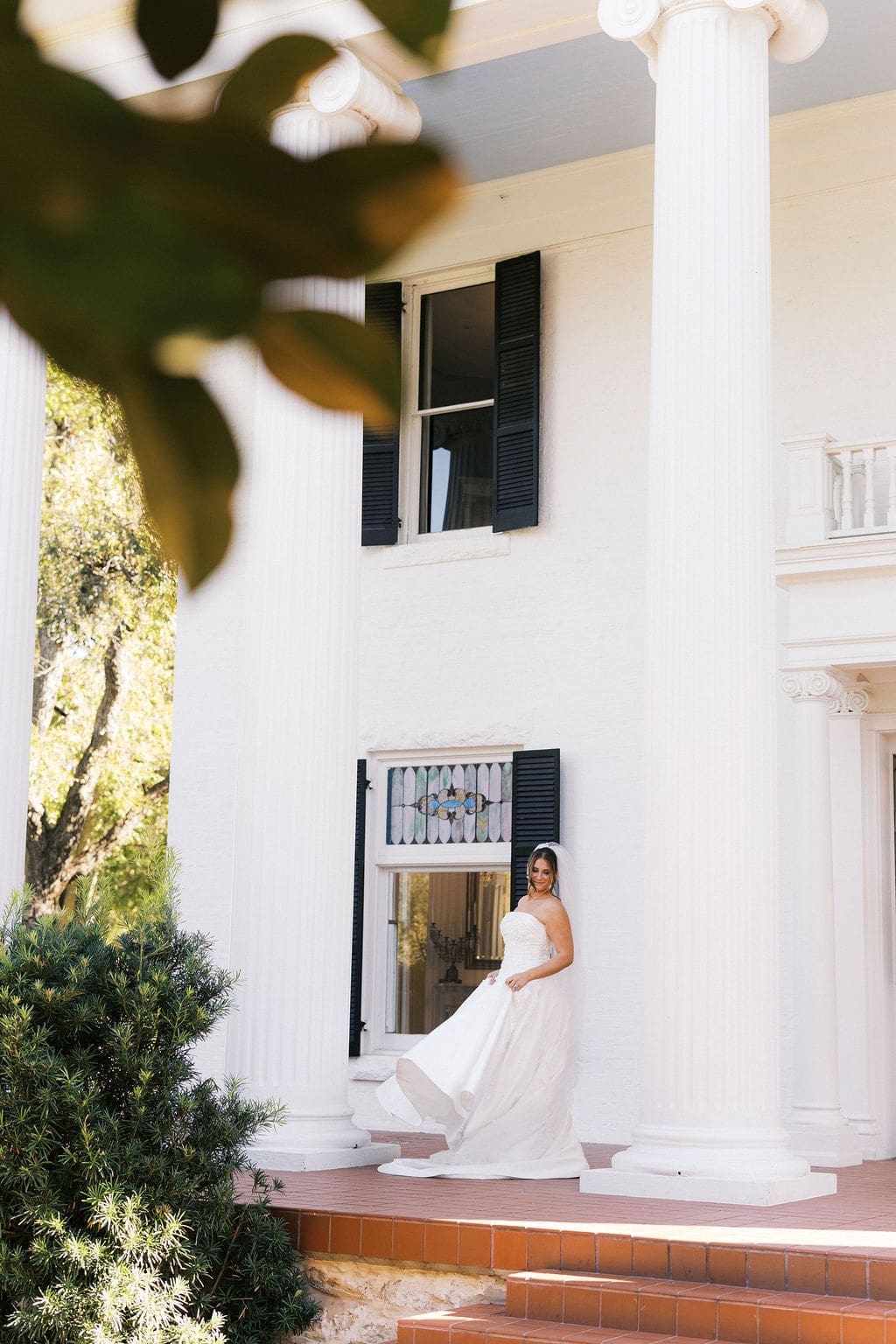 The bride spinning around in her dress during her bridal portait shoot