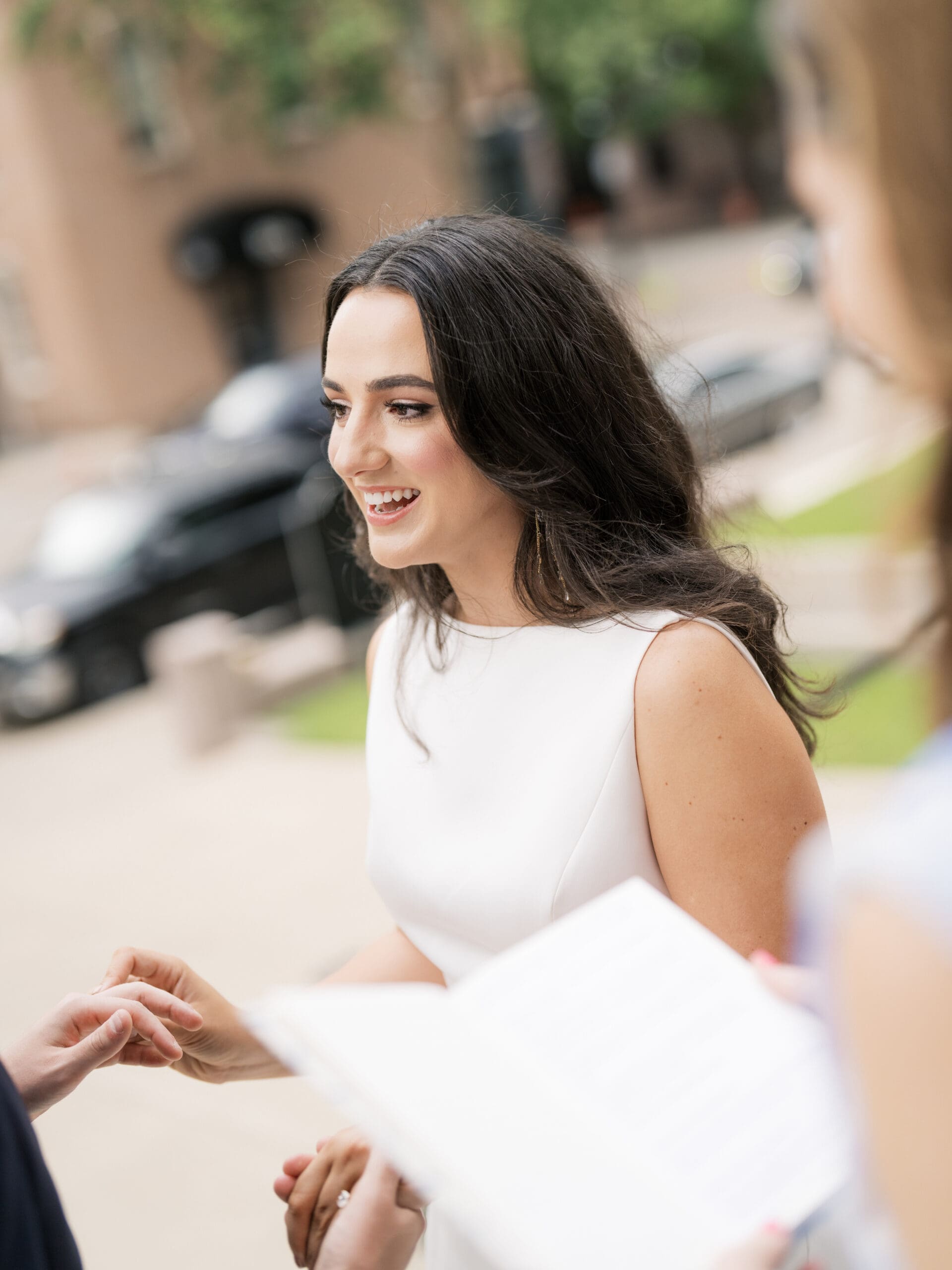 Bride smiling and laughing during her courthouse wedding in Houston